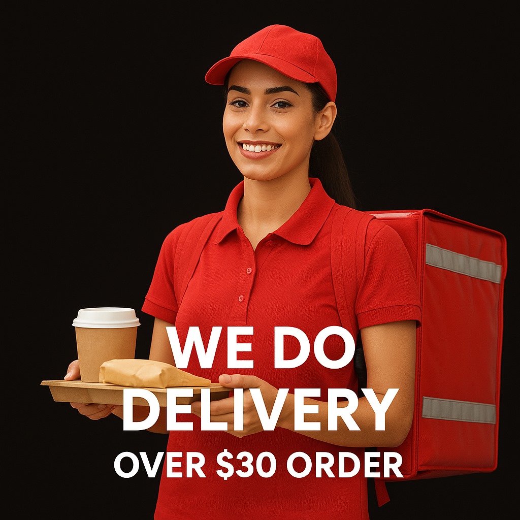 A smiling delivery driver holding food